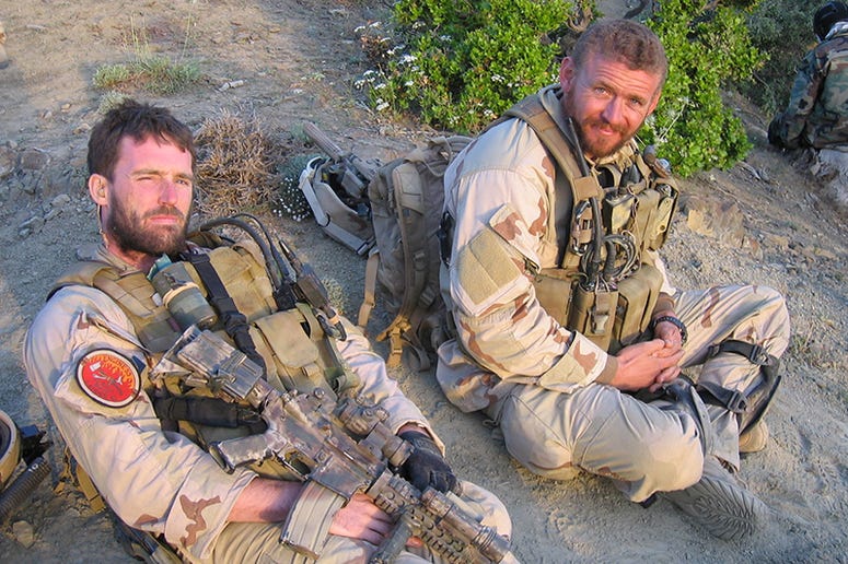 Navy SEAL Matthew Axelson, right, and Michael Murphy. NavySEALMatthewAxelson
