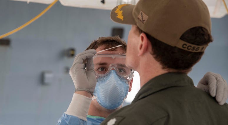 Navy Seaman Hayden Runyon, a medical corpsman assigned to 3rd Medical Battalion, 3rd Marine Logistics Group