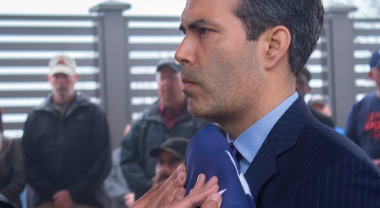 George P. Bush with flag