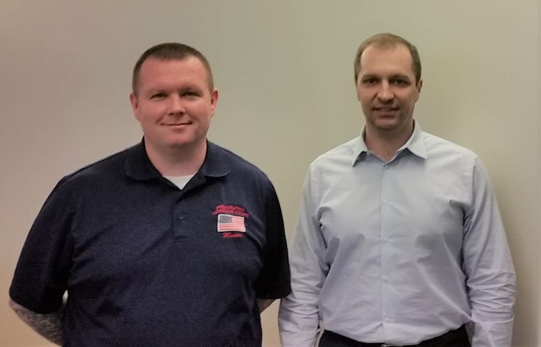 USMC vet Tim Wynn (l) and his attorney, Army vet Brian Kint USMC vet Tim Wynn and Army vet and attorney Brian Kint of Philadelphia law firm Cozen OConnor