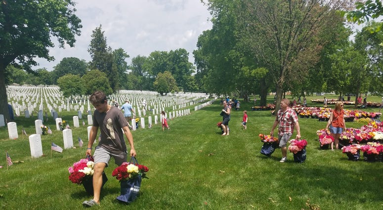 The Memorial Day Flower Foundation brings blooms to Arlington National Cemetery graves. MemorialDayFlowers