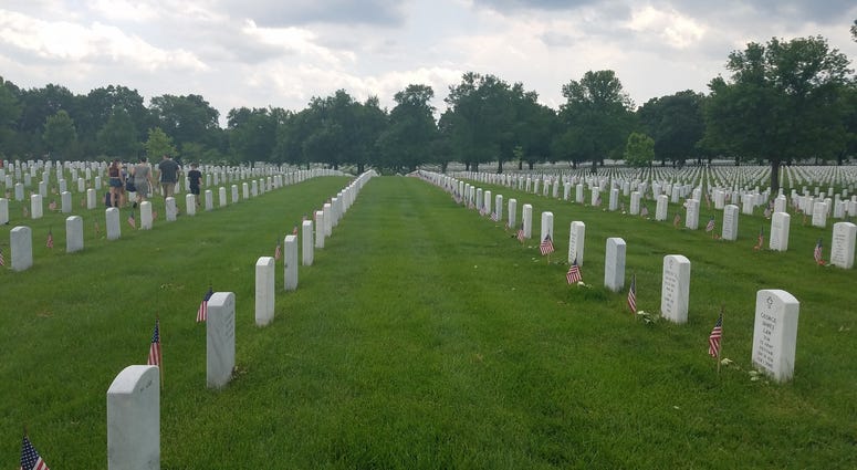 The Memorial Flowers Foundation brings blooms to Arlington National Cemetery graves. MemorialDayFlowers