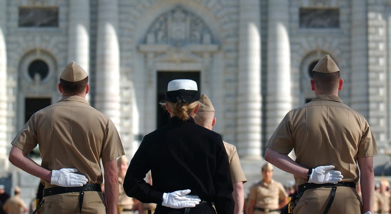 U.S. Naval Academy Midshipmen participate in a practice parade