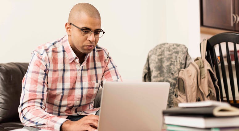 Adult student working on a computer