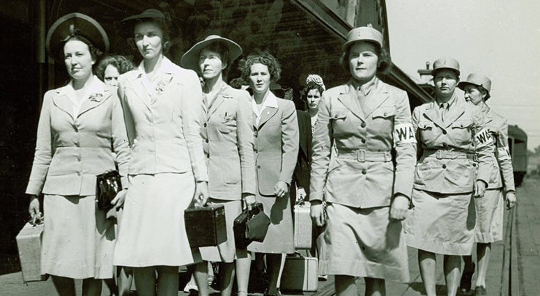 Newly arrived Women's Army Auxiliary Corps recruits march at Fort Des Moines, Iowa, in 1942. Newly arrived Women's Army Auxiliary Corps recruits march at Fort Des Moines, Iowa, in 1942.