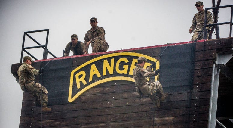 Soldiers of the Airborne and Ranger Training Brigade demonstrate how to rappel. Toronto Blue Jays players joined the 75th Army Ranger Regiment in December for training.