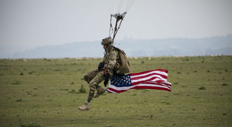 U.S Army Special Forces commemorate WWII with jump into Mont Saint-Michel, Normandy, France. U.S Army Special Forces commemorate WWII with jump into Mont Saint-Michel, Normandy, France.