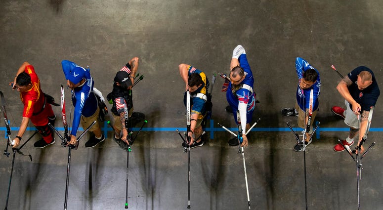 Archers begin the final rounds of archery in the recurve bow division Archers begin the final rounds of archery in the recurve bow division