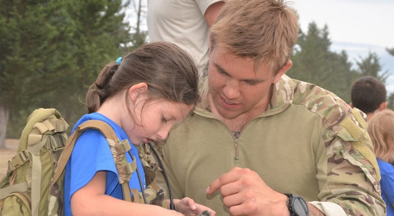 Service member with child