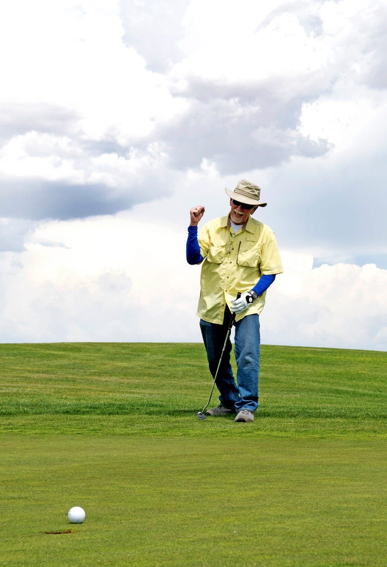 U.S. Army Veteran Henry Davis celebrates as his ball is about to go into the hole at the Twin Warriors Golf Club, Bernalillo, New Mexico. U.S. Army Veteran Henry Davis celebrates as his ball is about to go into the hole at the Twin Warriors Golf Club, Bernalillo, New Mexico.