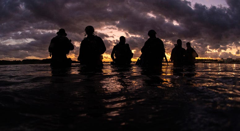 Members assigned to Naval Special Warfare Group 2 conduct military dive operations off the East Coast of the United States.