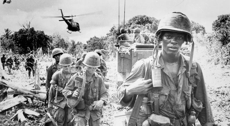 Men of the 173rd Airborne Brigade on a search and destroy patrol after receiving supplies, 1966. Men of the 173rd Airborne Brigade on a search and destroy patrol after receiving supplies, 1966.