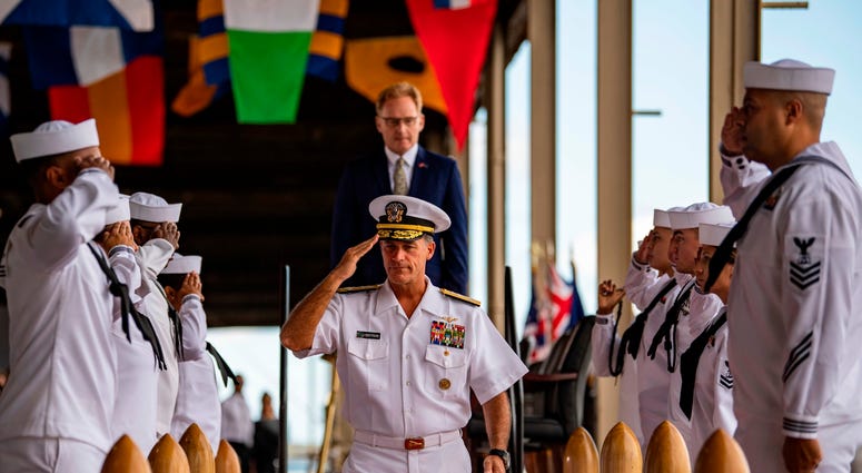 Adm. John C. Aquilino, Commander, U.S. Pacific Fleet, and Acting Secretary of the Navy Thomas B. Modly, depart the stage