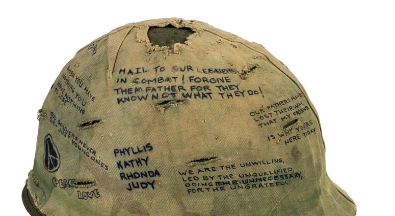 Veteran Sal Gonzalez wore this helmet liner at the meat-grinder battle dubbed “Hamburger Hill.” In May 1969, scores of Americans died or were wounded in repeated assaults up heavily defended Ap Bia Mountain. Veteran Sal Gonzalez wore this helmet liner at the meat-grinder battle dubbed “Hamburger Hill.” In May 1969, scores of Americans died or were wounded in repeated assaults up heavily defended Ap Bia Mountain.