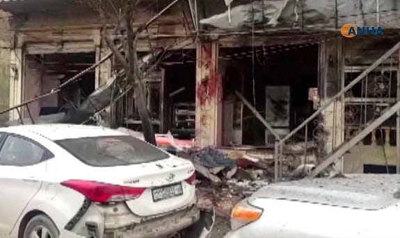 A damaged restaurant where an explosion occurred, in Manbij, Syria, Wednesday, Jan. 16, 2019.