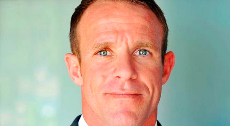 This 2018 file photo provided by Andrea Gallagher shows her husband, Navy SEAL Edward Gallagher Defense say Navy SEAL prosecutors spied on them