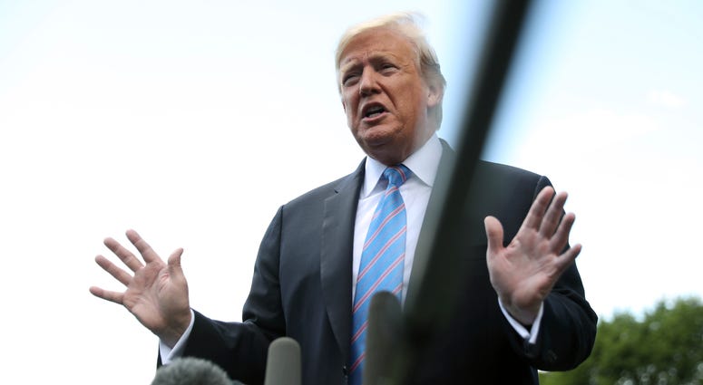 President Donald Trump speaks to members of the media on the South Lawn of the White House in Washington, Trump says US not ramping up for military conflict with Iran