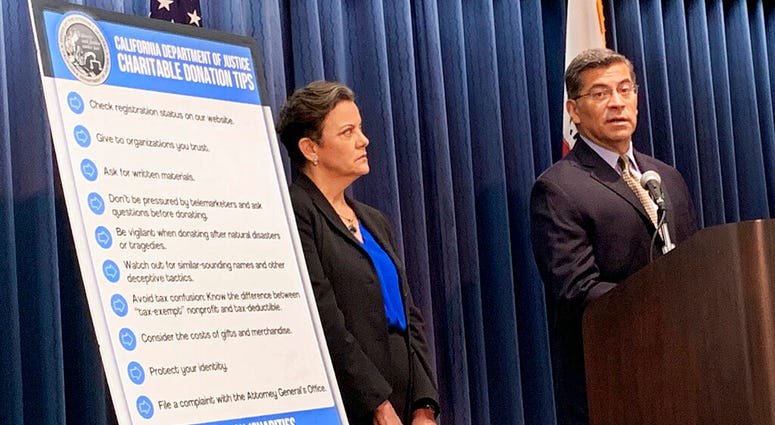 California Attorney General Xavier Becerra, right, and senior Assistant Attorney Genera Tania Ibanez announce a lawsuit the state has filed alleging misdeeds by Move America Forward California Attorney General Xavier Becerra, right, and senior Assistant Attorney Genera Tania Ibanez announce a lawsuit the state has filed alleging misdeeds by Move America Forward