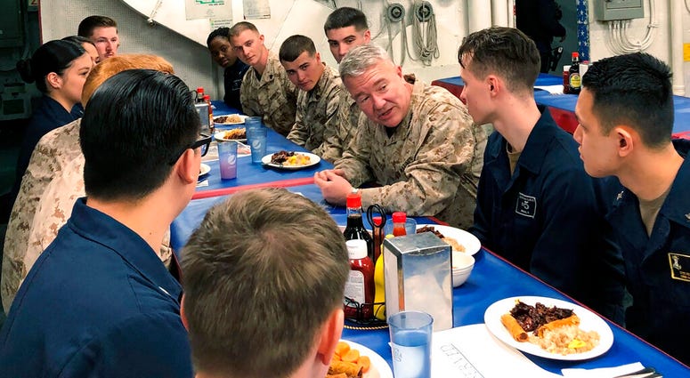 Marine Gen. Frank McKenzie, the top U.S. commander for the Middle East, meets with sailors and Marines on the USS Bataan amphibious assault ship on Thursday, Jan. 23, 2020