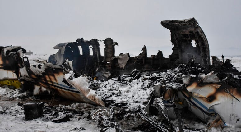 A wreckage of a U.S. military aircraft that crashed in Ghazni province, Afghanistan, is seen Monday, Jan. 27, 2020