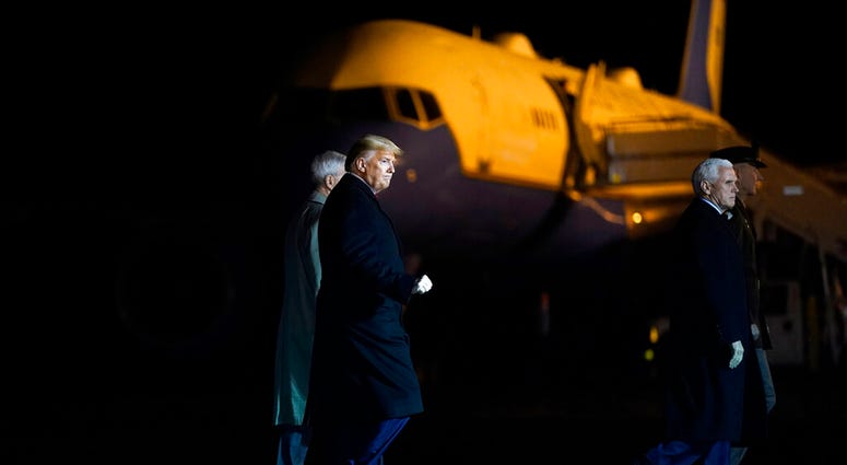 President Donald Trump and Vice President Mike Pence depart after watching a casualty return for Sgt. 1st Class Javier Gutierrez, of San Antonio, Texas and Sgt. 1st Class Antonio Rodriguez