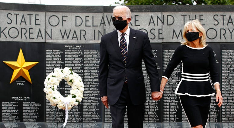 Democratic presidential candidate, former Vice President Joe Biden and Jill Biden, arrive to lay a wreath at the Delaware Memorial Bridge Veterans Memorial Park, Monday, May 25, 2020