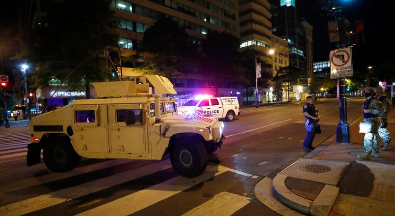 A military Humvee blocks an intersection along K Street in downtown Washington