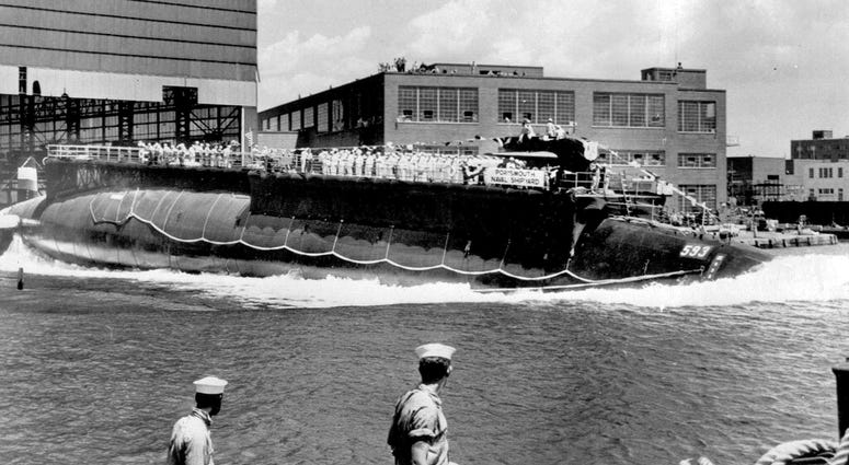In this July 9, 1960, file photo, the U.S. Navy nuclear powered attack submarine USS Thresher is launched bow-first at the Portsmouth Navy Yard in Kittery, Maine.