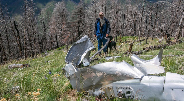 This June 2016, file photo shows wreckage from a U.S. Air Force that bomber crashed on Emigrant Peak