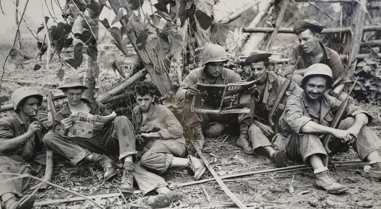 This Aug. 2, 1944 photo, courtesy of the U.S. Army Signal Corps, shows members of the famed WWII Army unit Merrill's Marauders less than 75 yards from enemy positions