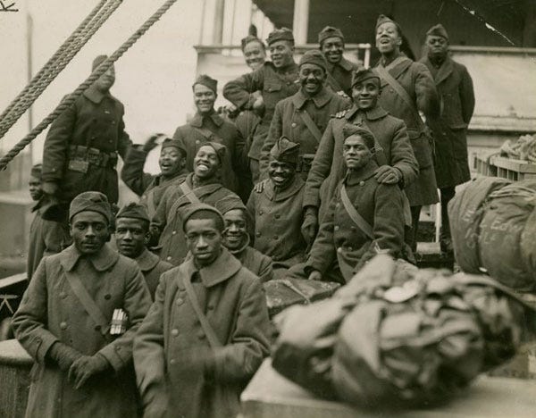 Members of the 369th Harlem Hellfighters relax aboard ship as they return home after World War I. Having helped to win the war in Europe, all would soon resume the struggle for freedom at home. 369th Harlem Hellfighters: African American World War I