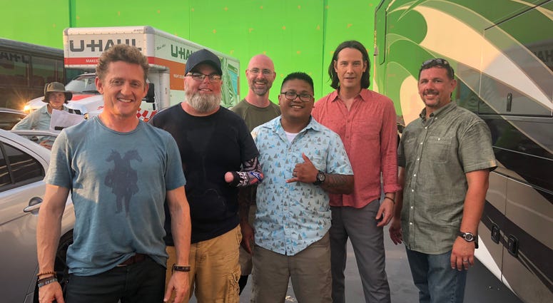 Military veterans pose with actors Keanu Reeves, Bill Winter on the set of the new Bill and Ted movie Military veterans pose with actors Keanu Reeves, Bill Winter on the set of the new Bill and Ted movie