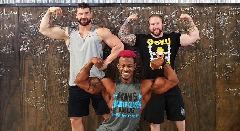 Justin "Boflex" Bohannon (center) connects Texas veterans with a free 90-day gym membership of their choice.
