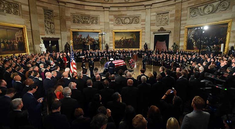 Dec 3, 2018; Washington, DC, U.S.A; President George H.W. Bush arrives to lie in state at the U.S. Capitol Rotunda. The late president will lie in state until 7 a.m. Wednesday, Dec. 5, 2018.