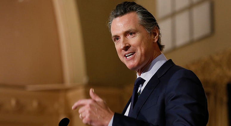 In this Jan. 17, 2019 file photo, Gov. Gavin Newsom speaks at the California Legislative Black Caucus Martin Luther King Jr., Breakfast, in Sacramento, Calif. Newsom is withdrawing several hundred National Guard troops from the nation's southern border a