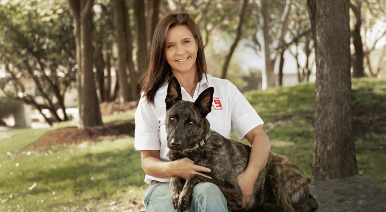 Mission K9 president Kim Maurer with one of her rescues, Chucky. KristenMaurerMissionK9