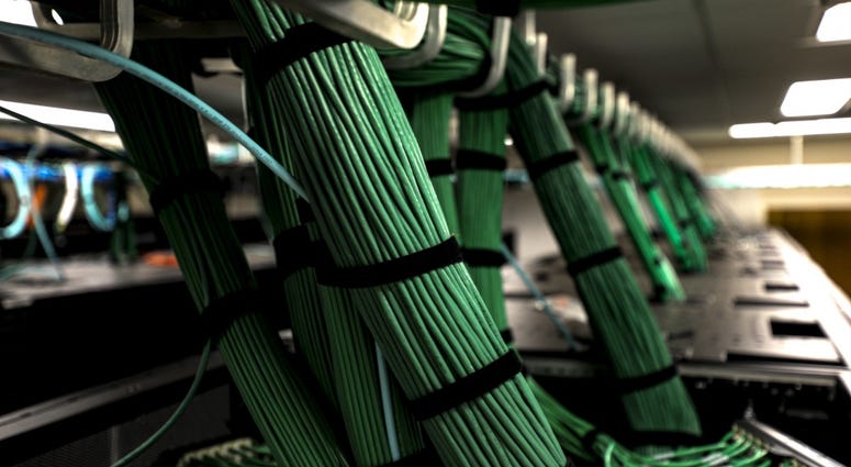 Server wire connections - part of the cyber environment where every day NCEM, NCDIT and NCNG and other agencies battle to protect and deter malicious cyber attacks to North Carolina's cyber infrastructure. CyberSecurity