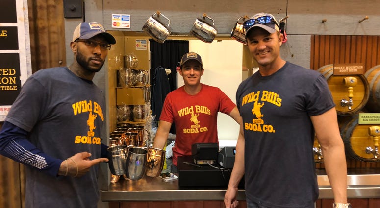Marine Corps vets Courtney Brown, James Ferguson and Josh Frasier of Wild Bill's Soda at an event. (l-r) Marine Corps veterans Courtney Brown, James Ferguson and Josh Frasier of Wild Bill's Soda