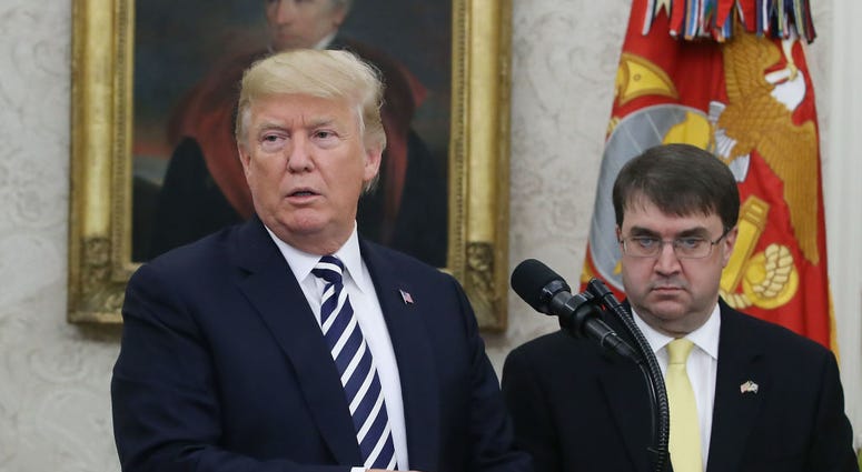 U.S. President Donald Trump speaks during a swearing-in ceremony for Robert Wilkie (R), to become Secretary of the Department of Veterans Affairs, in the Oval Office at the White House, on July 30, 1018 in Washington, DC. WilkieTrump