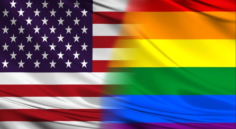 usa and rainbow silk flags america and lgbt flags - stock photo
