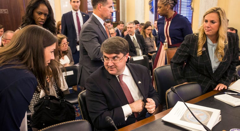 U.S. Secretary of Veterans' Affairs Robert Wilkie prepares to depart after testifying during a Senate Veterans' Affairs Committee hearing on suicide among veterans on June 19, 2019 in Washington, DC. Wilkie