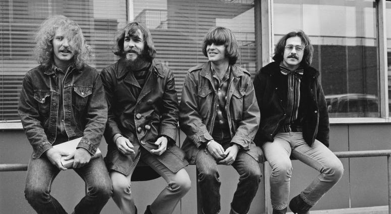 American rock band Creedence Clearwater Revival, UK, 7th April 1970; they are John Fogerty, Tom Fogerty, Stu Cook, and Doug Clifford. Tom Fogerty helping homeless military veterans