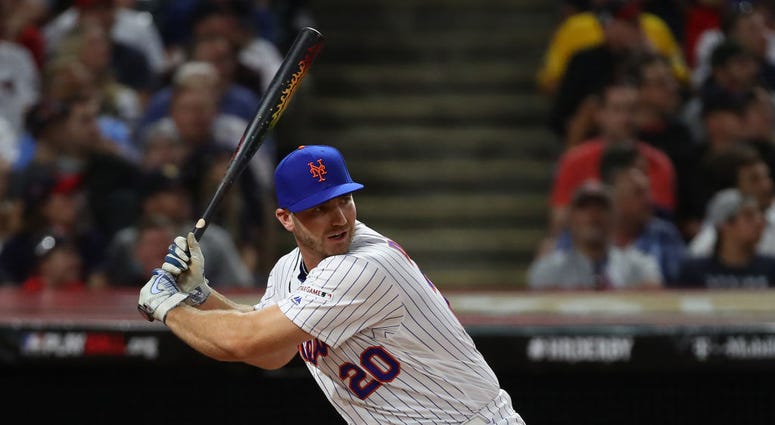 Pete Alonso of the New York Mets competes in the T-Mobile Home Run Derby at Progressive Field on July 08, 2019 in Cleveland, Ohio. Pete Alonso of the New York Mets competes in the T-Mobile Home Run Derby at Progressive Field on July 08, 2019 in Cleveland, Ohio.