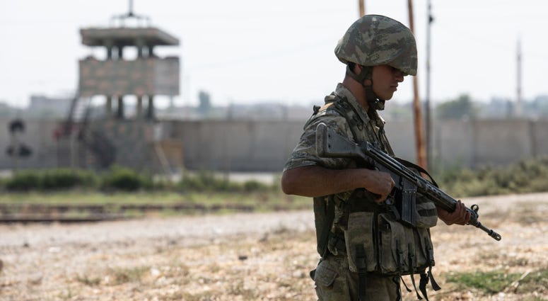 Turkish soldiers stand guard on the Turkish side of the border between Turkey and Syria on October 09, 2019 in Akcakale, Turkey. Turkish soldiers stand guard on the Turkish side of the border between Turkey and Syria on October 09, 2019 in Akcakale, Turkey.