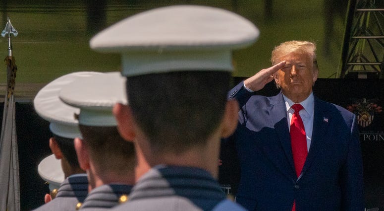 U.S. President Donald Trump salutes cadets at the beginning of the commencement ceremony on June 13, 2020 in West Point, New York. U.S. President Donald Trump salutes cadets at the beginning of the commencement ceremony on June 13, 2020 in West Point, New York.
