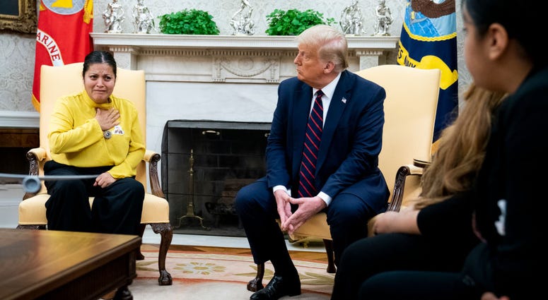 President Donald Trump meets with Gloria Guillen, mother of missing Fort Hood soldier Vanessa Guillen, in the Oval Office of the White House July 30, 2020 in Washington, DC. President Donald Trump meets with Gloria Guillen, mother of missing Fort Hood soldier Vanessa Guillen, in the Oval Office of the White House July 30, 2020 in Washington, DC.