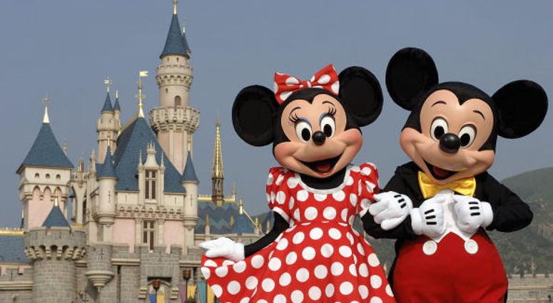HONG KONG - SEPTEMBER 1: (EDITORIAL USE ONLY) In this handout photo provided by Disney, Mickey and Minnie Mouse are seen in front of the Sleeping Beauty Castle at the new Disneyland Park on September 1, 2005 in Hong Kong. The new theme park and vacation r U.S. Military Members: Enjoy Specially Priced Theme Park Tickets in 2020