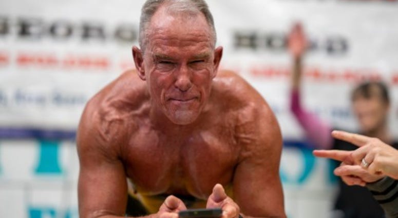 Marine veteran George Hood breaks world record for planking Marine veteran George Hood breaks world record for planking