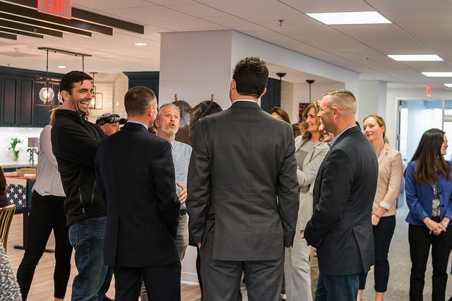 Stewart delivering the laughs to TAPS family and staff at the reception