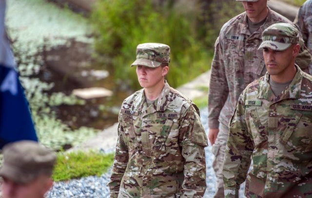 Staff Sgt. Amanda F. Kelley marches in formation during her Ranger School graduation at Fort Benning, Ga., Aug. 31, 2018. AmandaKelley